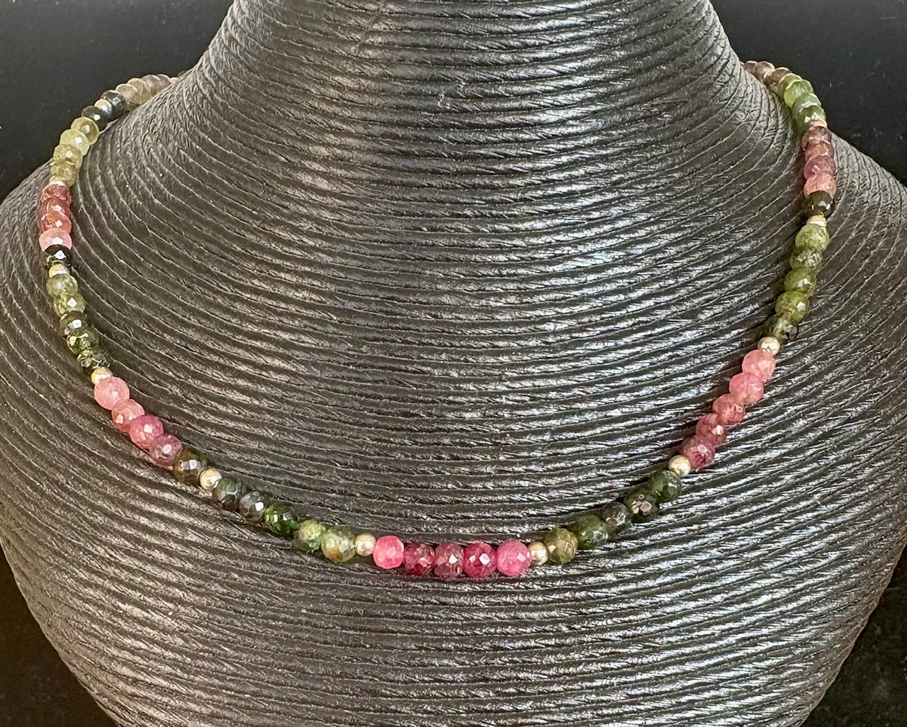 Jolie Esprit Watermelon tourmaline necklace on a gray bust