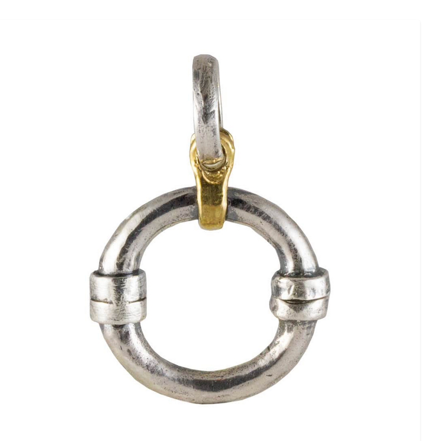 Silver and gold circular charm holder on a white background