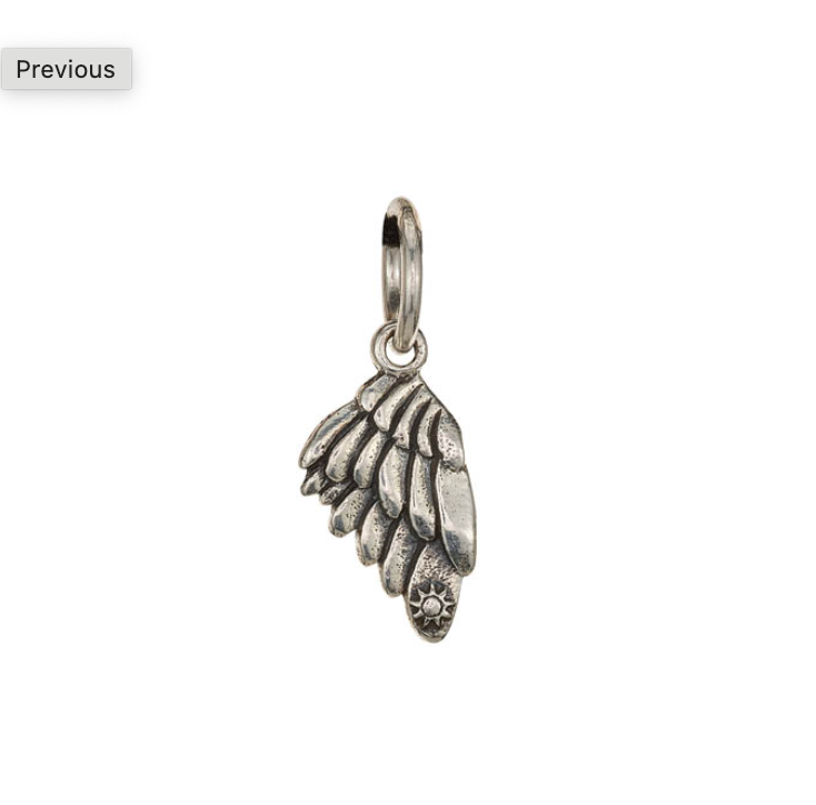 Silver angel wing pendant on a white background