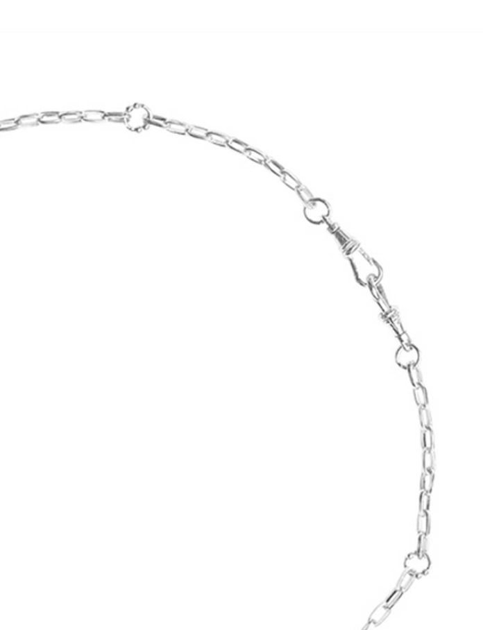 Silver chain necklace on a white background