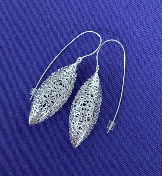 Jolie Esprit Sterling Silver filigree earrings on a blue background
