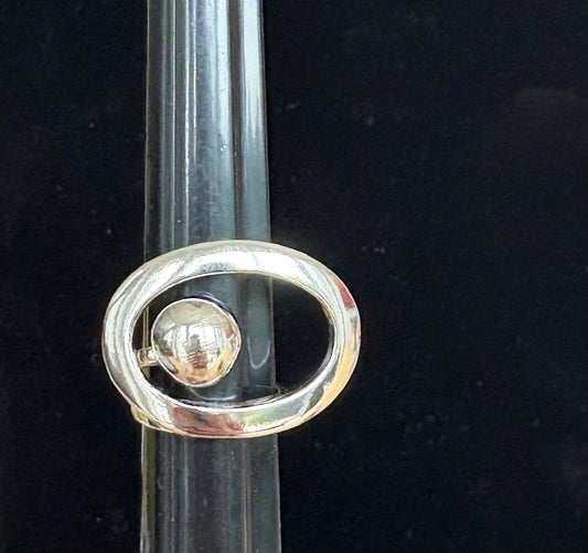 Jolie Esprit sterling silver ring with  on a black background