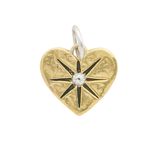 Gold heart-shaped pendant with star design and central gemstone on a white background