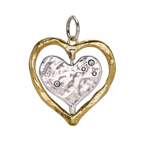 Waxing Poetic Heart-shaped pendant with gold and silver finish on a white background