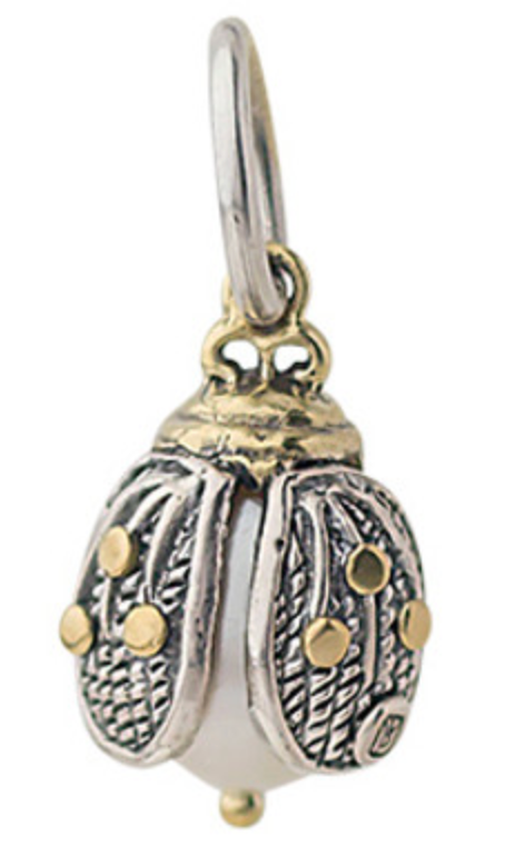 Silver and pearl Ladybug charm on a white background. Made by Waxing Poetic