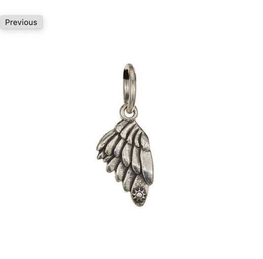 Silver angel wing pendant on a white background